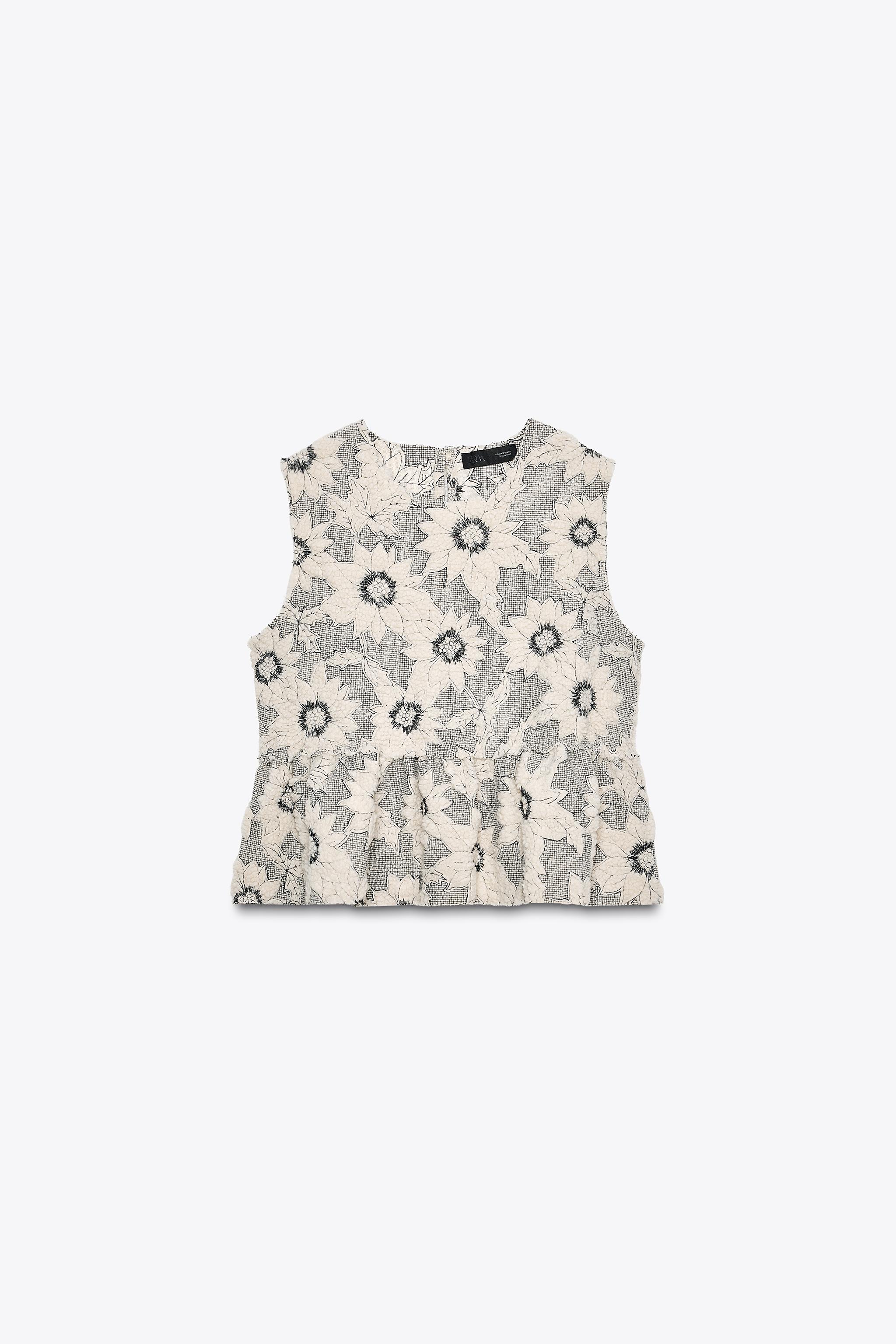 TOP PÉPLUM TEXTURÉ FLEURS